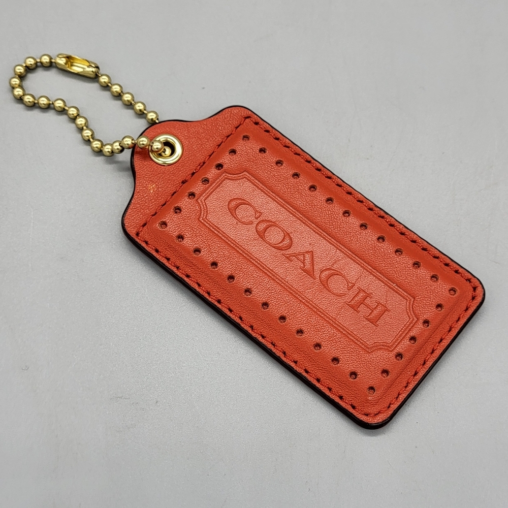 Coach Perforated Leather Tag with Gold Chain